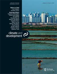 Cover of Climate and Development, showing a person wading through flooded coastal fields with high-rise blocks on the horizon
